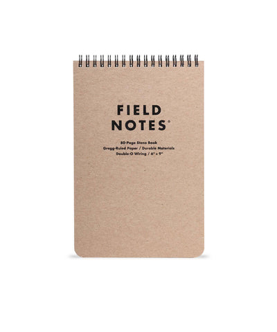 A single kraft brown steno pad with spiral binding at top. Field Notes logo in black ink.